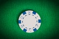 Macro white poker chip on green table Royalty Free Stock Photo