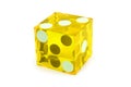 Macro yellow dice isolated on white / result as three on top with a light shadow Royalty Free Stock Photo