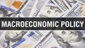 Macroeconomic policy text Concept Closeup. American Dollars Cash Money,3D rendering. Macroeconomic policy at Dollar Banknote. Royalty Free Stock Photo