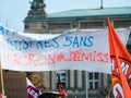 Macron leave placard - France experiences weeks of protests and