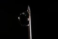 macrophotography of a drop of water attached to the tip of the syringe needle Royalty Free Stock Photo