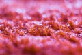 Macrophotography of a red towel with water droplets Royalty Free Stock Photo