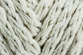 Macrophotography of a skein of yarn of natural color