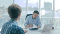 Mad, angry Boss humiliate employee, throws paper into his face.