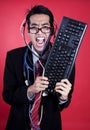 Mad businessman with keyboard and cables Royalty Free Stock Photo