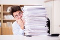 The mad businessman with piles of papers Royalty Free Stock Photo