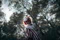 mad evil clown standing in the woods Royalty Free Stock Photo