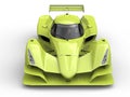 Mad green super sports racing car - top down front view
