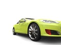 Mad lime green modern electric sports car - front wheel closeup shot Royalty Free Stock Photo