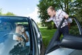 Mad man screaming at female driver Royalty Free Stock Photo