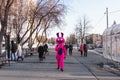 Mad March Hare walking down the street