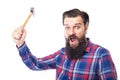 Bearded man holding hammer on white