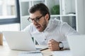 mad young businessman shouting at laptop Royalty Free Stock Photo