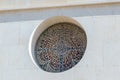 Stained glass window in the form of a cross in Memorial Church of Moses on Mount Nebo near the city of Madaba in Jordan