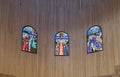 Stained glass windows hang on the wall in the prayer hall of Memorial Church of Moses on Mount Nebo near the city of Madaba in Jor