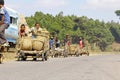 Madagascar boys carries a traditional caresa carriage