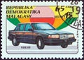 MADAGASCAR - CIRCA 1993: A stamp printed in Madagascar from the `Automobiles` issue shows Volvo, circa 1993. Royalty Free Stock Photo