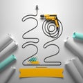 `2022` made of a drill wire and a set of construction tools, all on a white background. Royalty Free Stock Photo