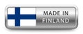 MADE IN FINLAND metallic badge with national flag isolated on a white background.