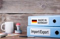 Made In Germany. Two binders on desk in the office. Business background Royalty Free Stock Photo