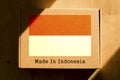 Made in Indonesia. Cardboard boxes with text `Made In Indonesia` and the Flag of Indonesia.