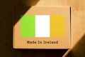 Made in Ireland. Cardboard boxes with text `Made In Ireland` and the Flag of Ireland.