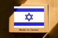 Made in Israel. Cardboard boxes with text `Made In Israel` and the Flag of Israel.