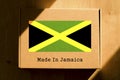 Made in Jamaica. Cardboard boxes with text `Made In Jamaica` and the Flag of Jamaica.