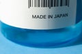 MADE IN JAPAN label written on pump bottle alcohol gel. Barcode. Close-up