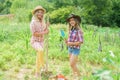 Made with love. small girls farmer in village garden. happy farming. spring country side. protect nature. Rich harvest Royalty Free Stock Photo