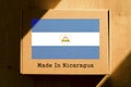 Made in Nicaragua. Cardboard boxes with text `Made In Nicaragua` and the Flag of Nicaragua.