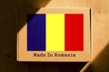Made in Romania. Cardboard boxes with text `Made In Romania` and the Flag of Romania.
