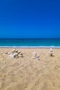 Made of stone tower on the beach. Balanced pebbles on beach Royalty Free Stock Photo