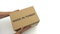 MADE IN TURKEY text on the box in hands