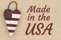 Made in the USA message with an old heart American flag Royalty Free Stock Photo