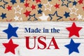 Made in the USA message with stars on a weathered whitewash wood Royalty Free Stock Photo