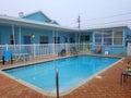Madeira Beach, Florida, U.S.A - February 18, 2021 - A vacation rental property with a swimming pool