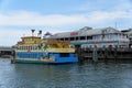 Madeira Beach, Florida, U.S - November 8, 2021 - The sunset cruise ship and Hooter`s Restaurant on the dock by John`s Pass and t