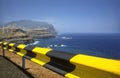 Madeira coastal road with cliffs and wind turbines Royalty Free Stock Photo