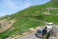 Madeira holiday summer trip vacation tourism mountains sunny day green trees landscape tourist busses Royalty Free Stock Photo