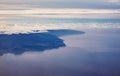Madeira Island in dusk / sunrise aerial view from plane window Royalty Free Stock Photo