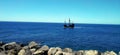 Pirate sailboat sailing in the bay