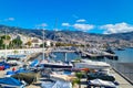 Madeira, Portugal, November 26, 2022: View of the pier with boats in the city of Funchal. Beautiful sea view of Madeira Royalty Free Stock Photo