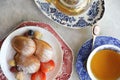 Madeleines , French sweet dessert with fruits and tea