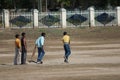 Boys playing criket in the town of Umaria. Royalty Free Stock Photo