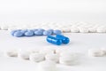 Madical background - blue and white pills Royalty Free Stock Photo