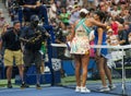 Madison Keys (L) and Jessica Pegula embrace by the net after round of 16 match at the 2023 US Open