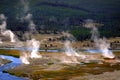 Madison River in Yellowstone National Park with Steam Rising from Hot Springs