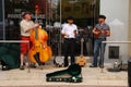 MADISON, WI - JULY 26th, 2014: Musicians take a break during a weekly Farmer's Market on the Wisconsin Capitol Square