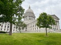 Madison Wisconsin State Capitol building with green grass and trees in the background Royalty Free Stock Photo